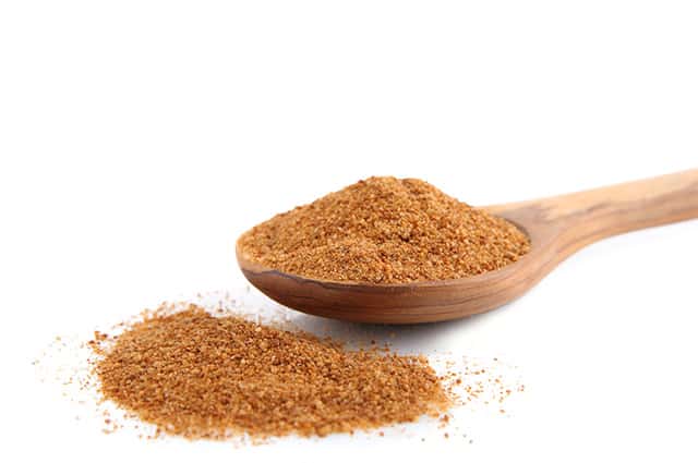 Coconut Sugar on a wooden spoon